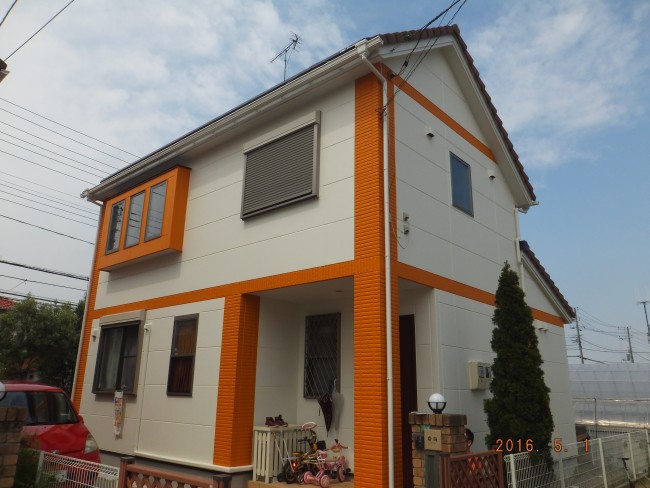 オレンジと白の外壁塗装・ベランダ防水工事を高耐久施工|船橋市